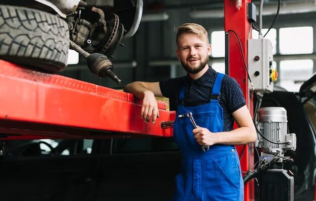 imgi_158_repairmen-leaning-car-elevator_23-2147898003