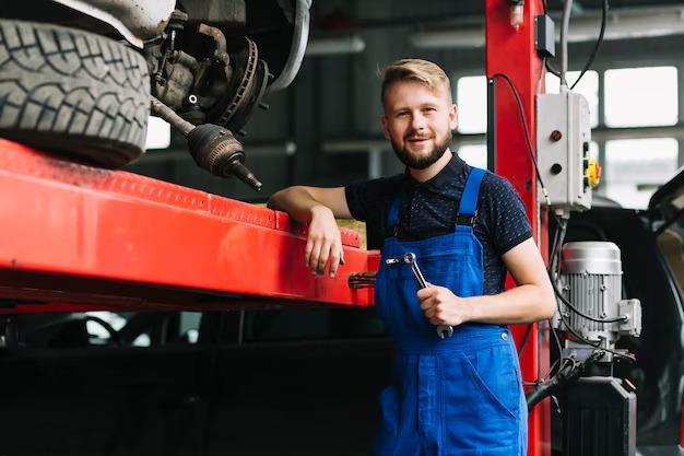 imgi_158_repairmen-leaning-car-elevator_23-2147898003